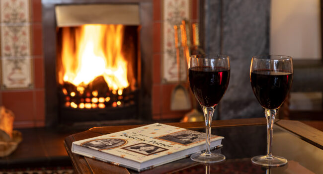 relax, wine by the fire